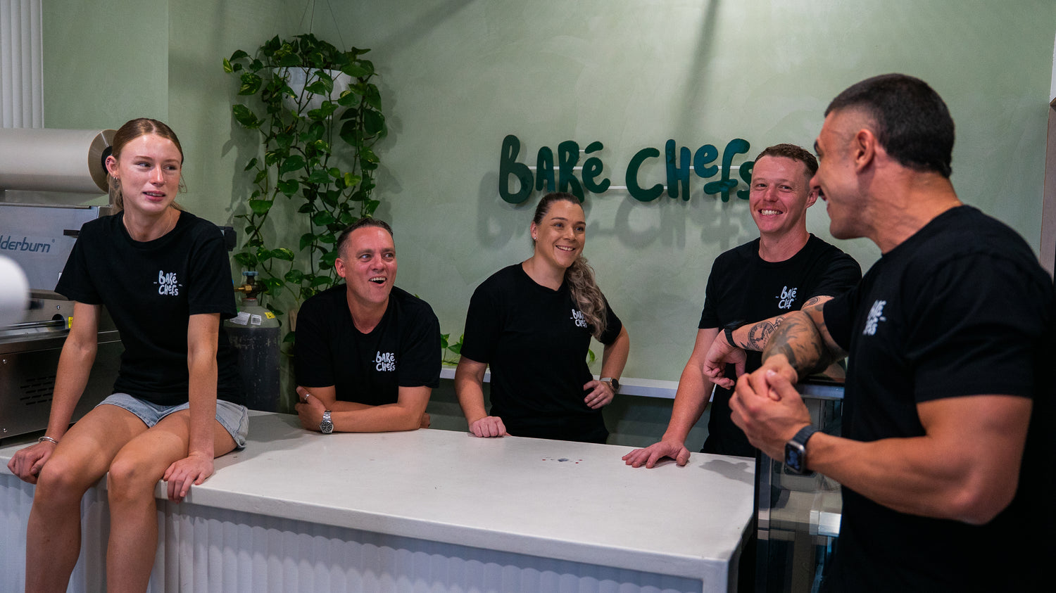 Sydney Bare Chefs team discussing menu options